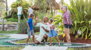 Family playing crazy golf